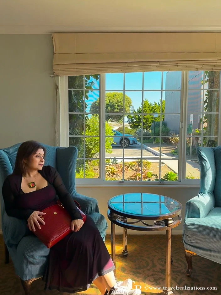 Chirasree of Travel Realizations relaxing in the lobby of The Morgan in San Simeon