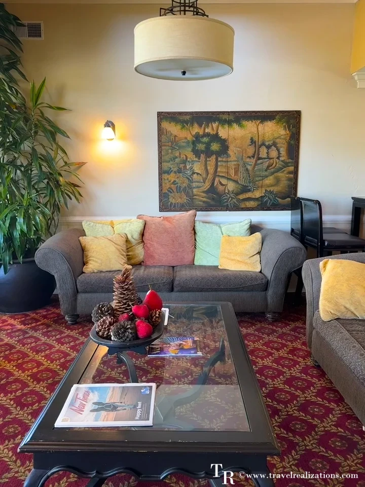 Cozy lounge with sofas and artwork at The Morgan in San Simeon